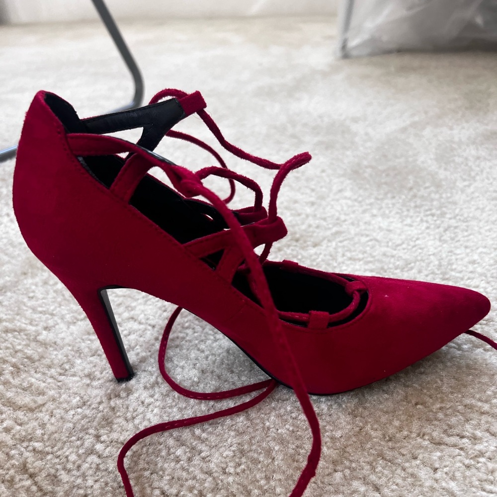 Lace up red heels